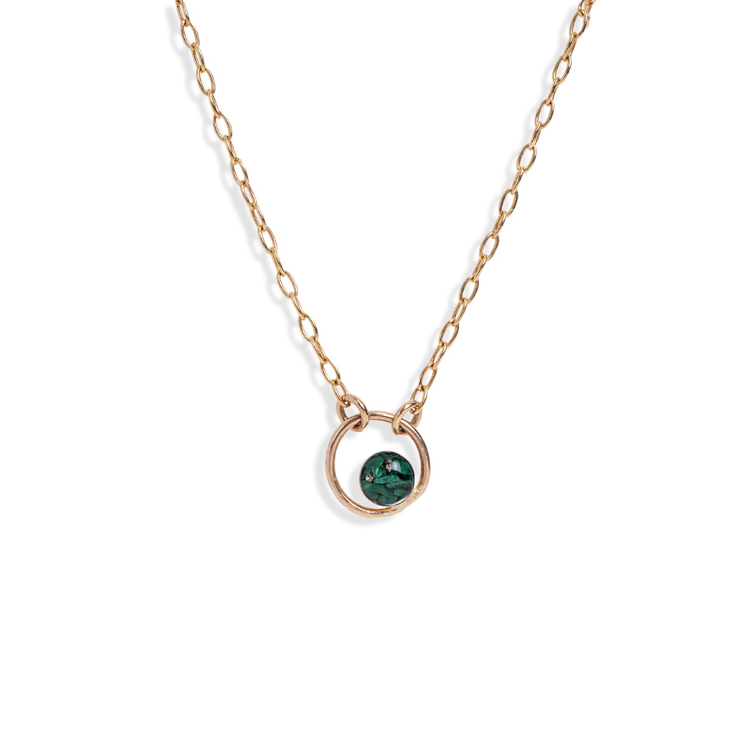 
                  
                    Tiny Malachite Orbit Necklace with bright natural green crystal is a perfect compliment to your everyday style.
                  
                