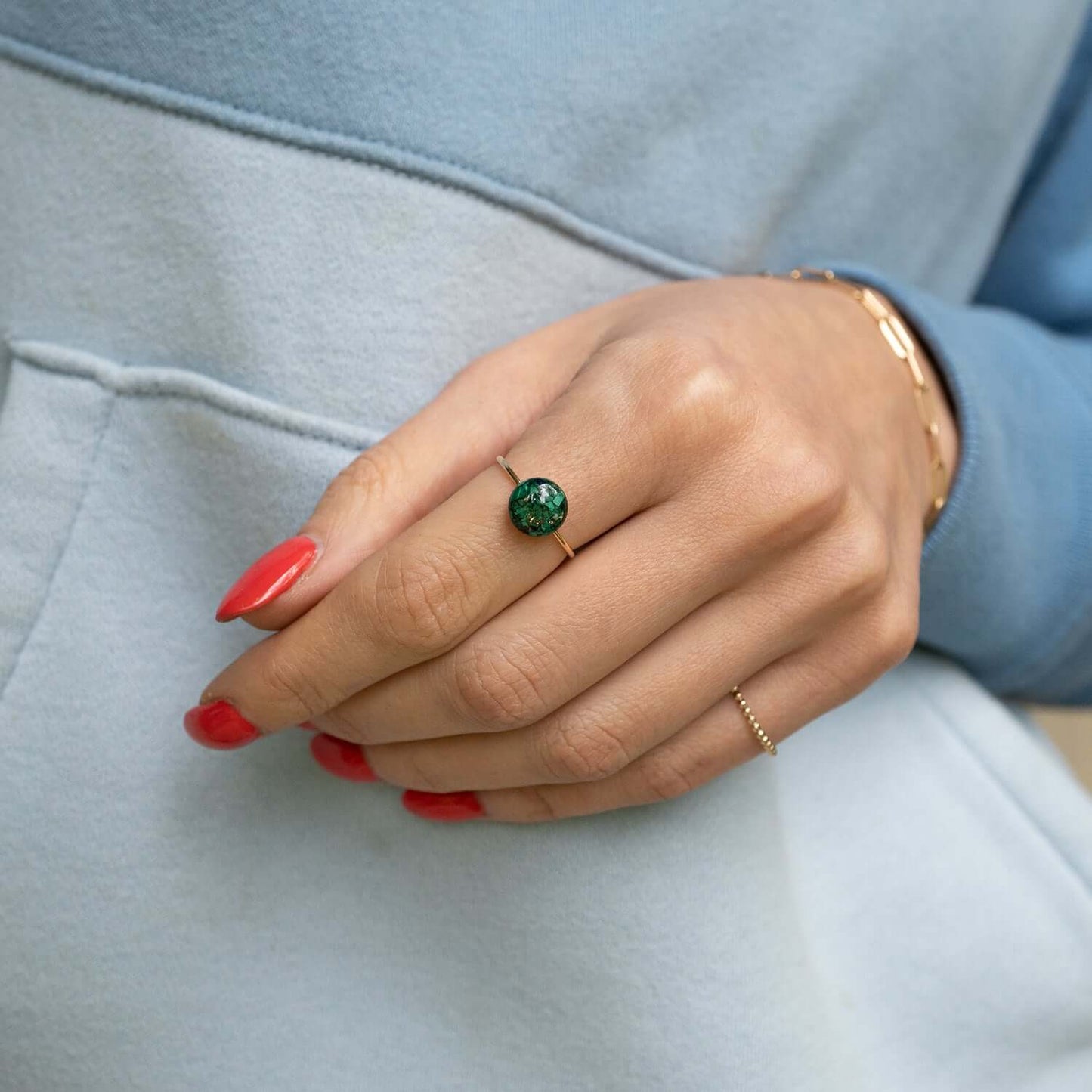 Delicate green ring with tiny Malachite stone pieces captured in glass like resin in a 8mm round shape. Bright natural green ring is a perfect compliment to your everyday style.