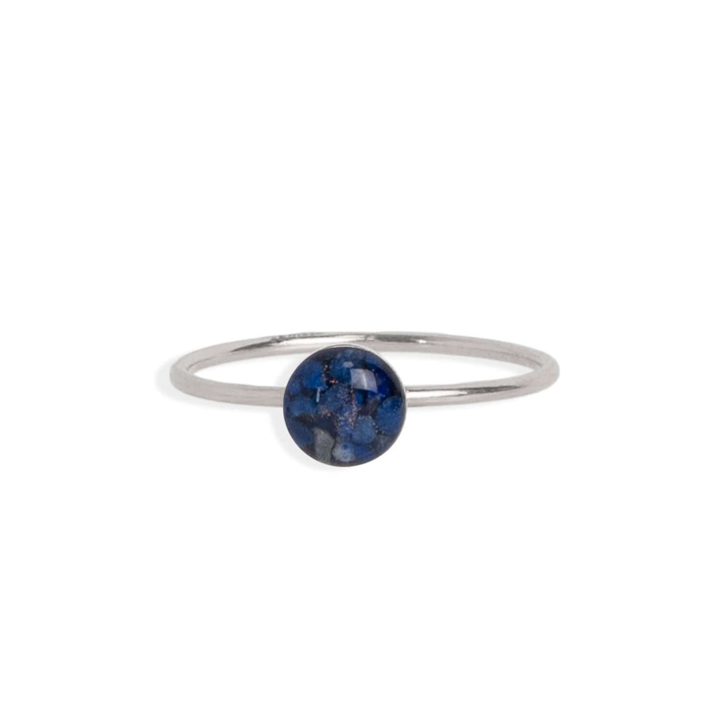 Dainty adorable rings with tiny real Lapis Lazuli stone pieces captured in glass like resin.