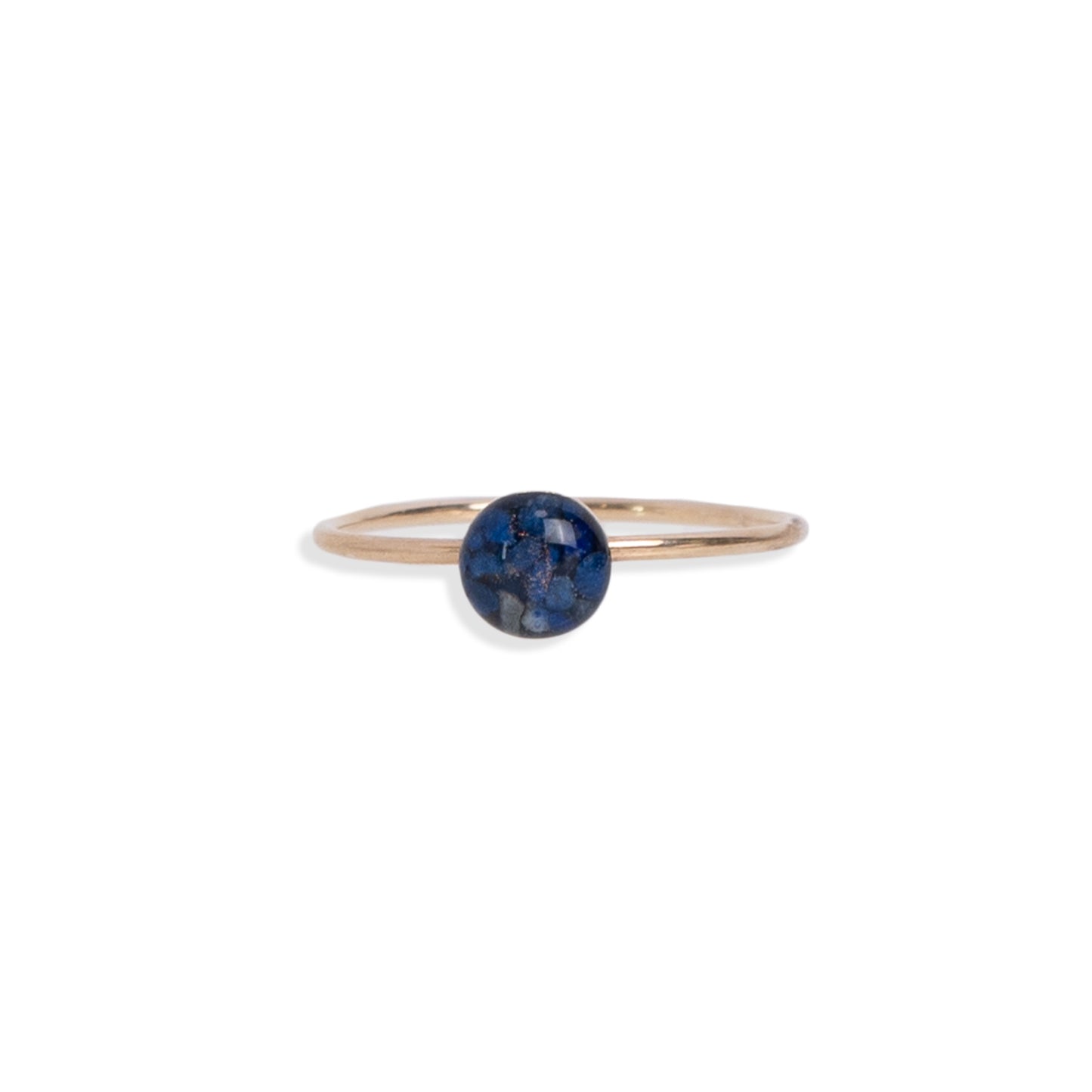 Dainty adorable rings with tiny real Lapis Lazuli stone pieces captured in glass like resin.