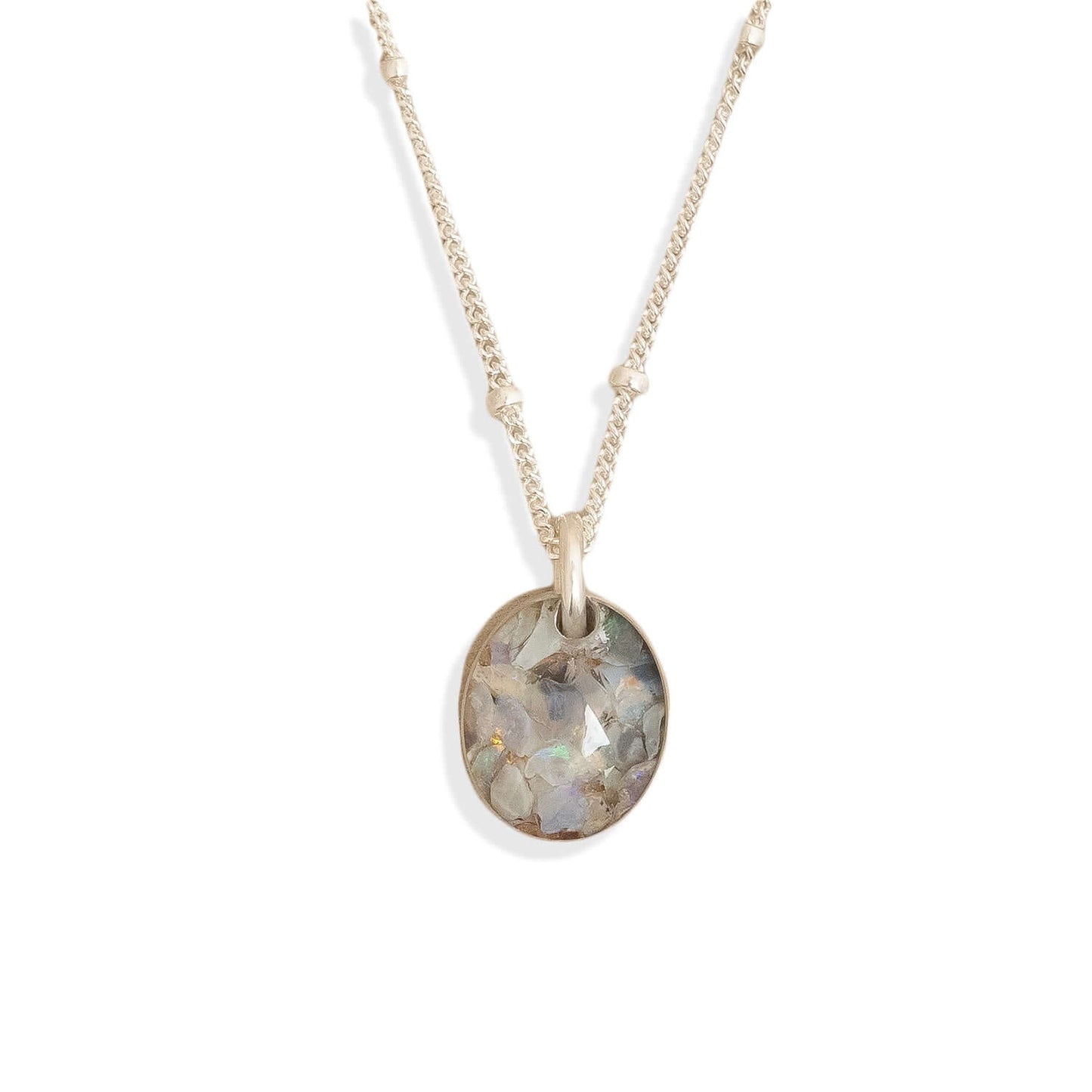 Necklace with a round pendant on a white background