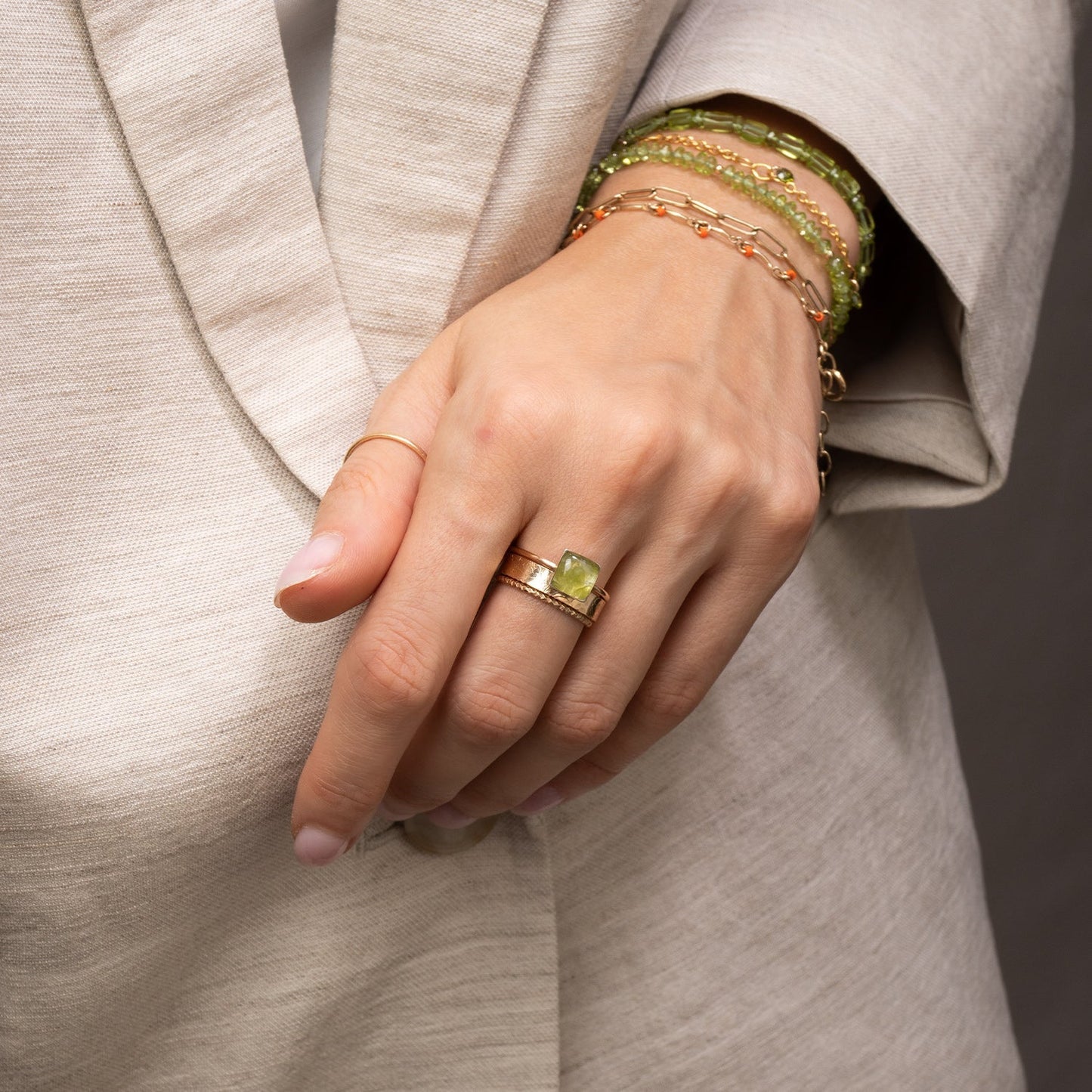 Peridot Square Ring on a model