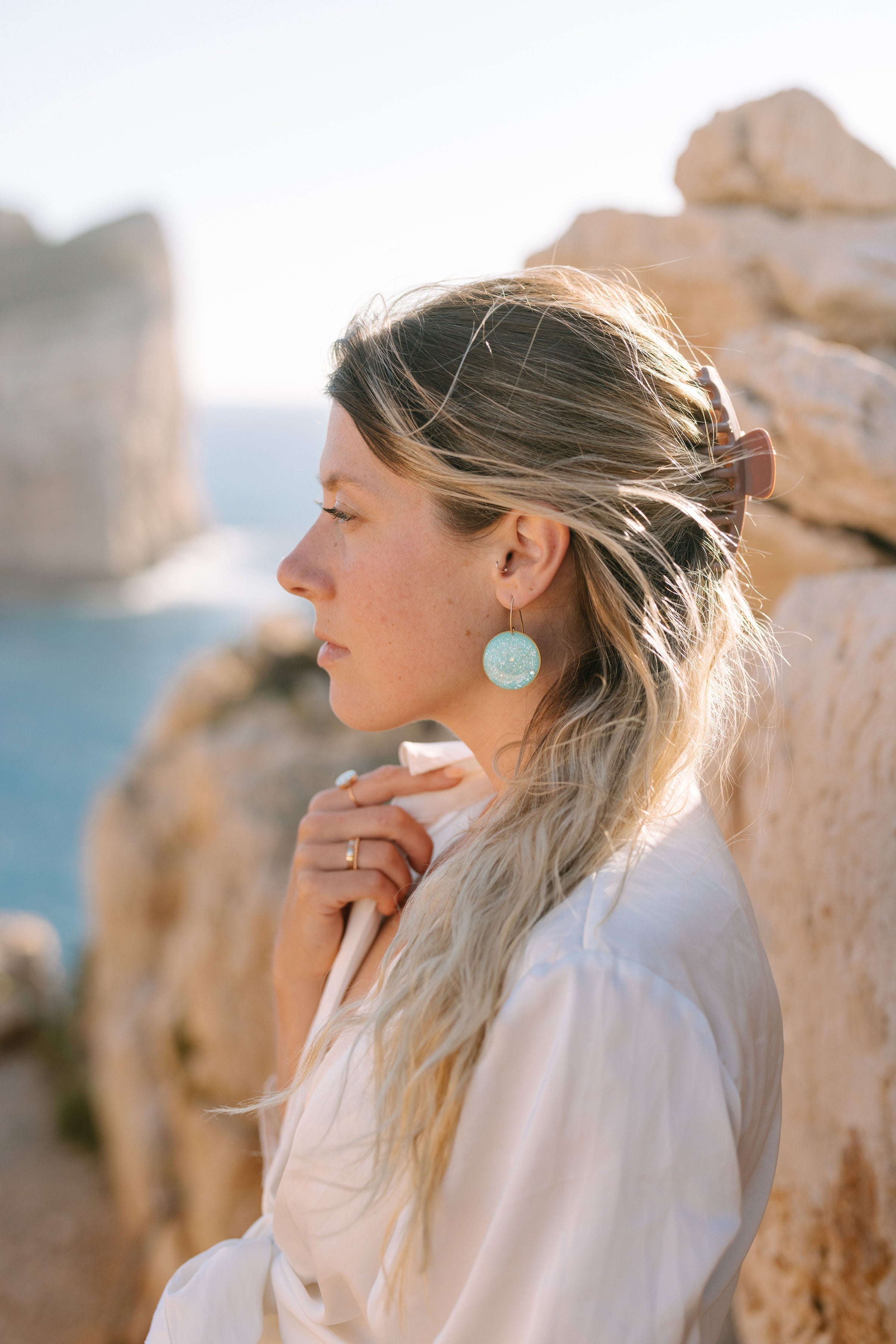 Handmade turquoise pendant necklace with crushed turquoise and mother-of-pearl in resin, Kate Koel Vacation Treasures collection