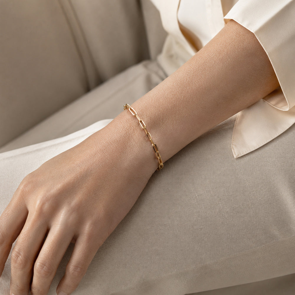 14k gold filled chain bracelet on a white background