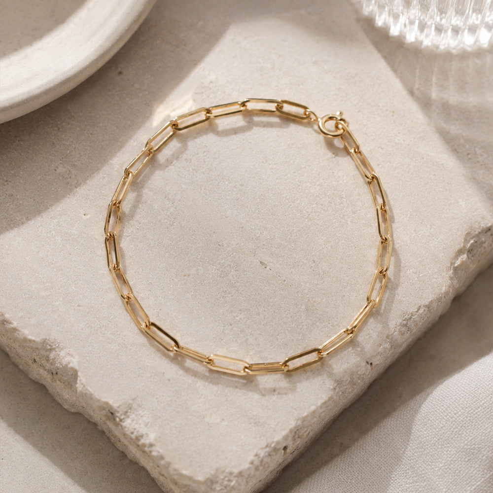 14k gold filled chain bracelet on a white background