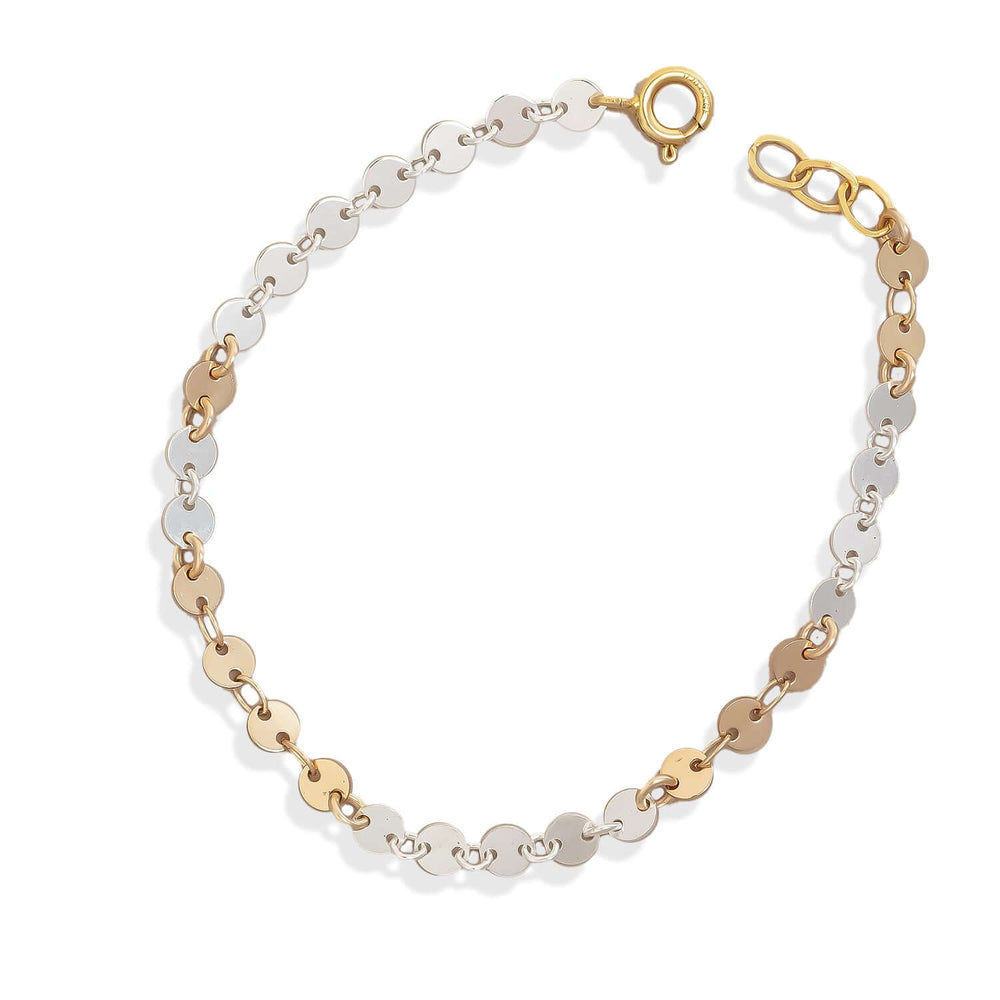 Bracelet with gold and silver chain links on a white background