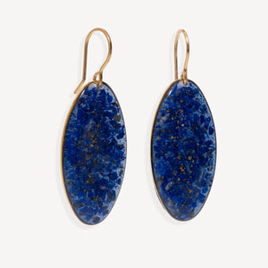 A pair of gold-tone drop earrings with oval blue agate pendants, shown against a plain off-white background.