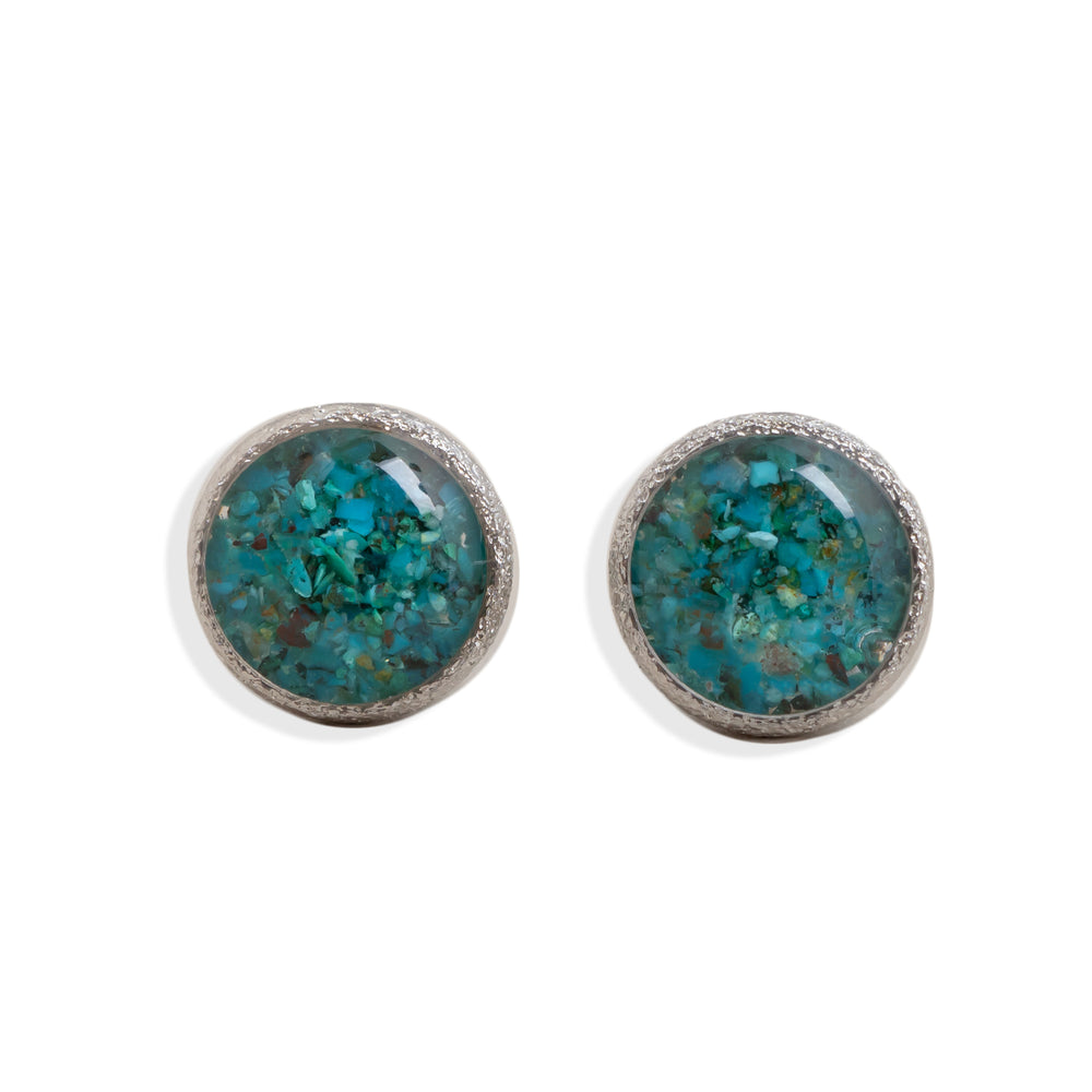 
                      
                        Pair of round earrings with teal stone centers on a white background
                      
                    