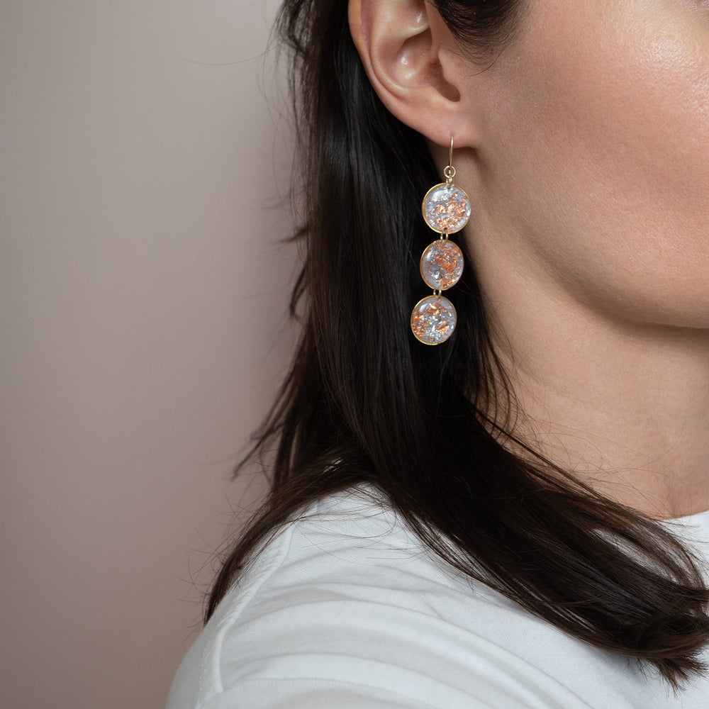 
                      
                        Statement Shimmer Foils Round Earrings
                      
                    