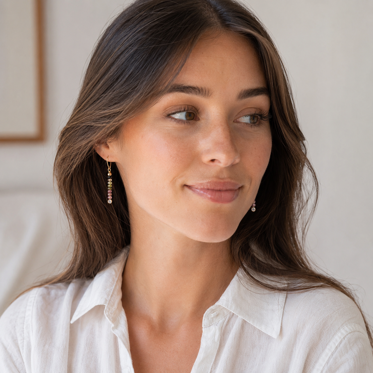 Woman wearing a watermelon Tourmaline Earrings wearing white shirt 