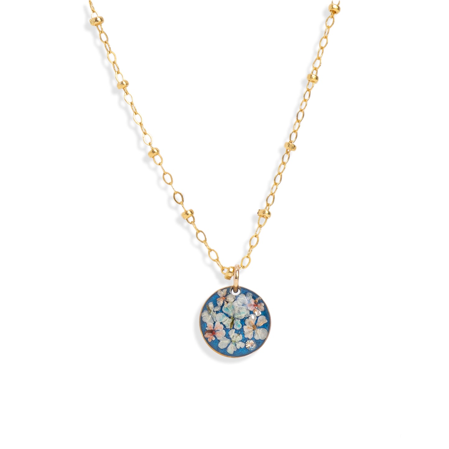 
                  
                    Delicate Circle Flower Blue Necklace
                  
                