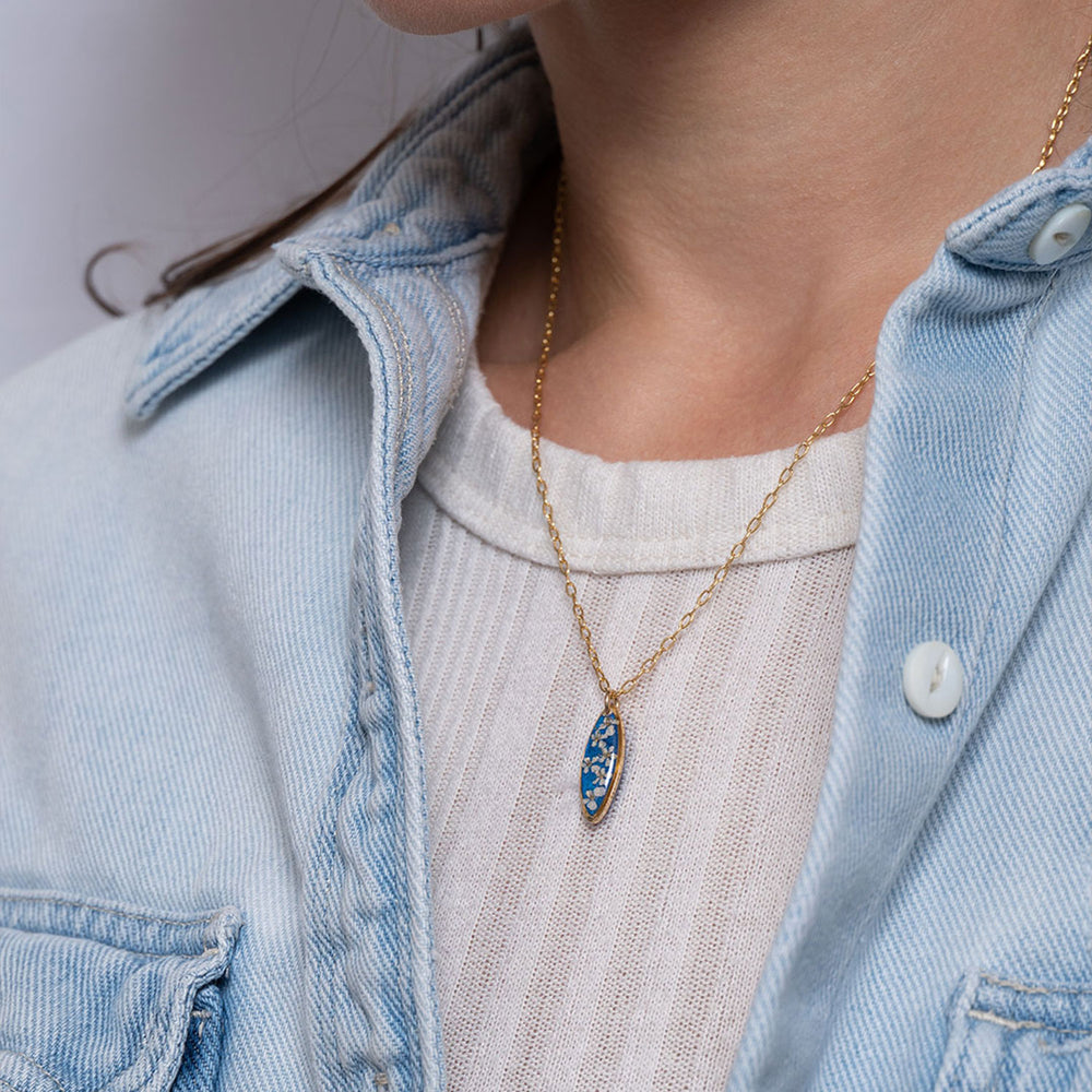 
                  
                    Oval Flower Blue Necklace
                  
                