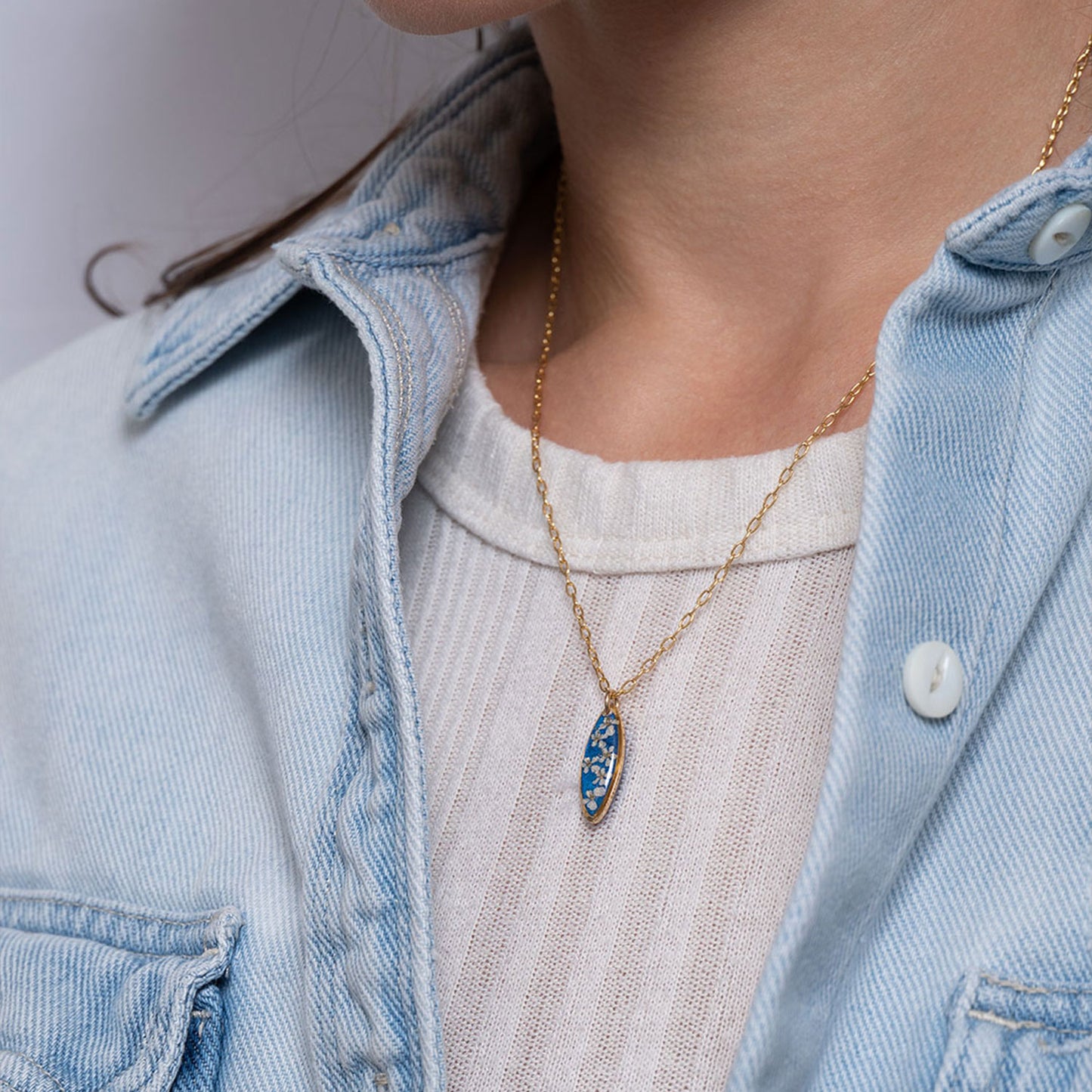 
                  
                    Oval Flower Blue Necklace
                  
                