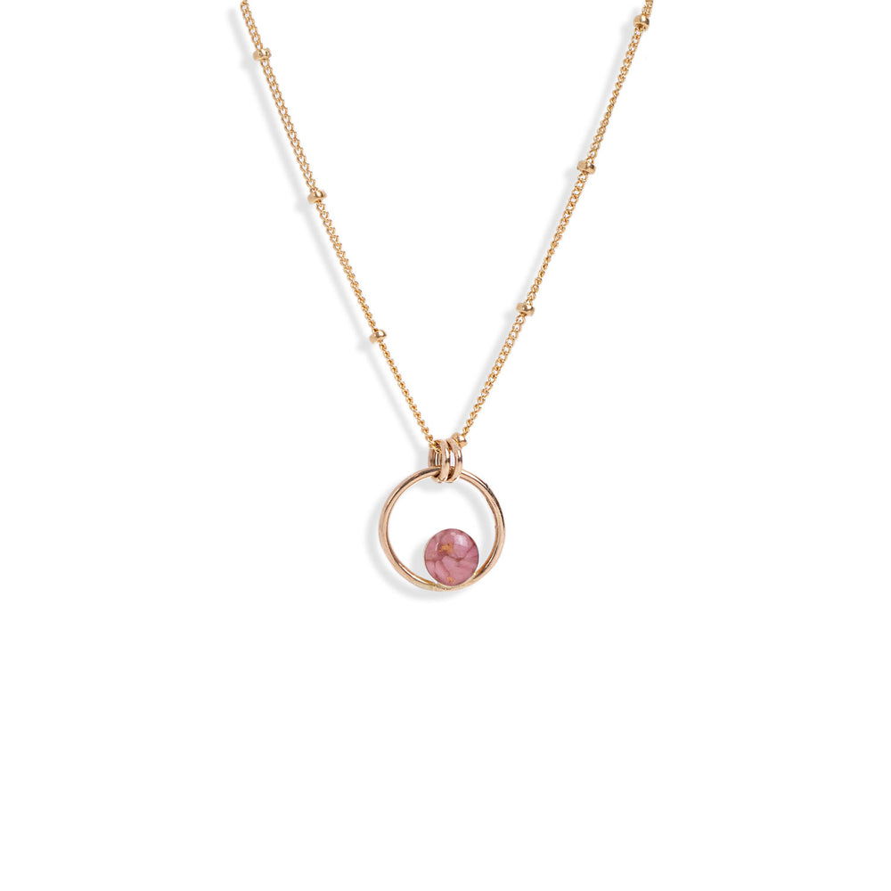 
                  
                    Tiny Pink Rhodonite Orbit Necklace.
                  
                