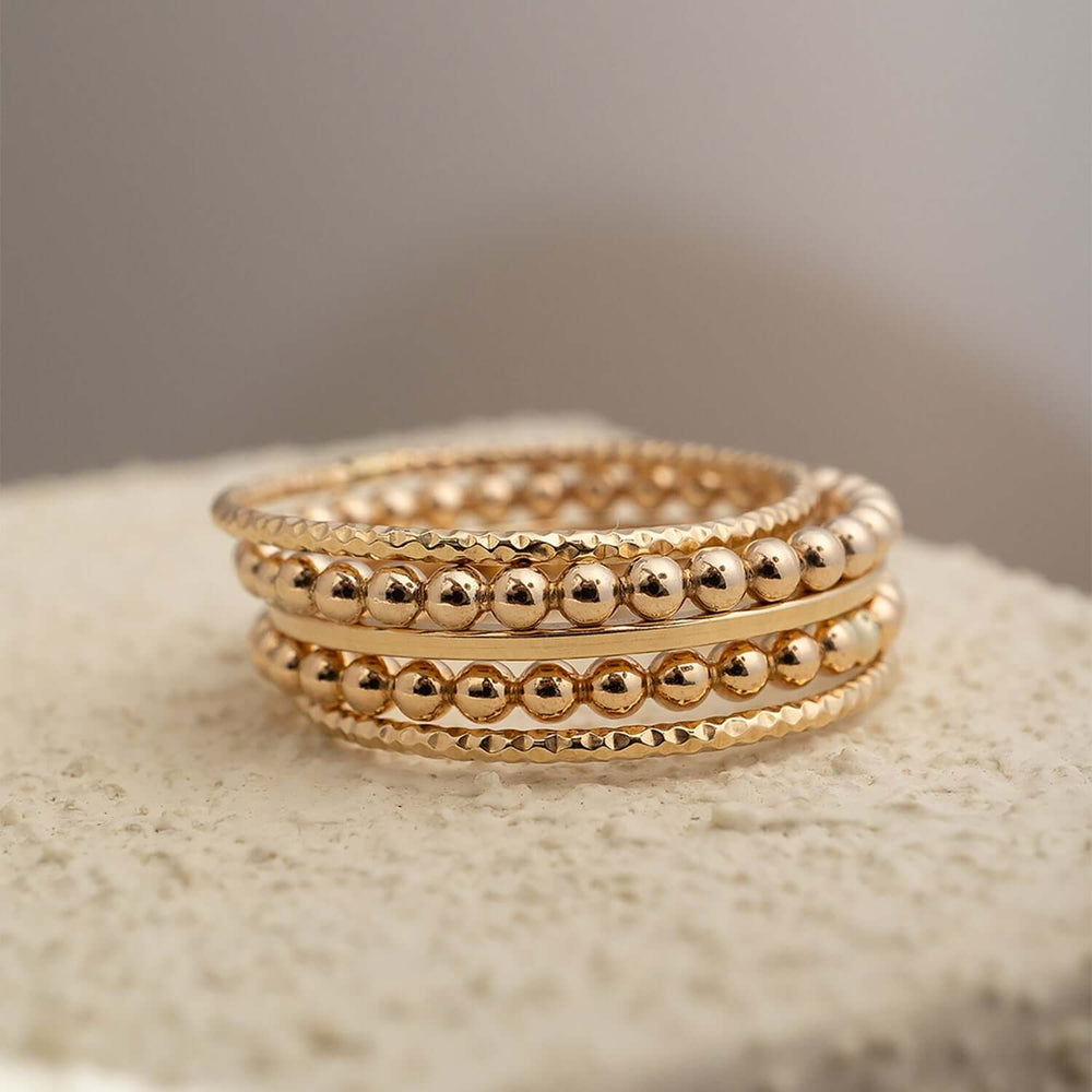 
                      
                        Pebble Stacking Ring Set
                      
                    