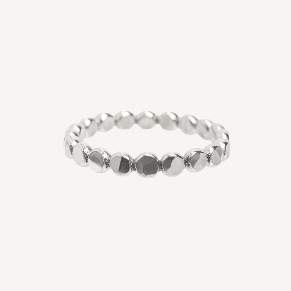 Silver bracelet with heart and diamond details on a white background