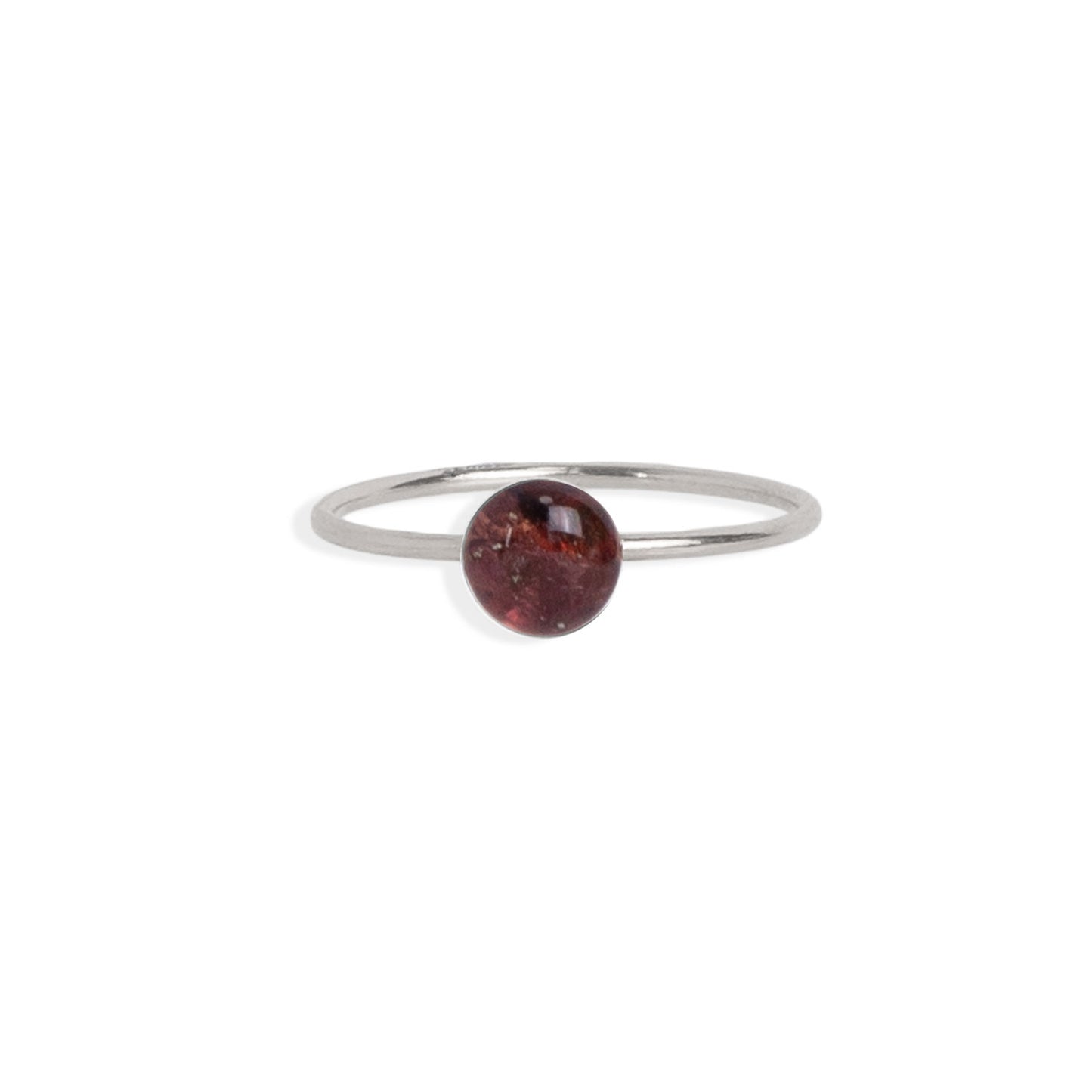 
                  
                    Tiny Round Garnet ring featuring a gold-filled band that gracefully wraps around your finger. What sets it apart is its crystal: a captivating, deep-red natural crushed Garnet stones encased in a glass-like resin.
                  
                