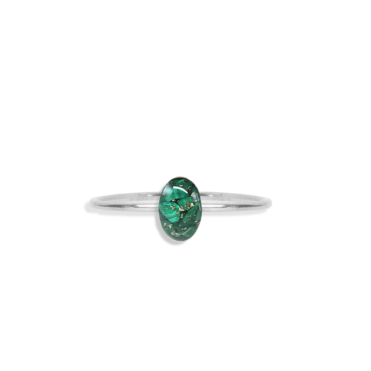 
                  
                    Tiny Delicate green oval ring with tiny Malachite stone pieces captured in glass like resin in three crystal sizes. 
                  
                