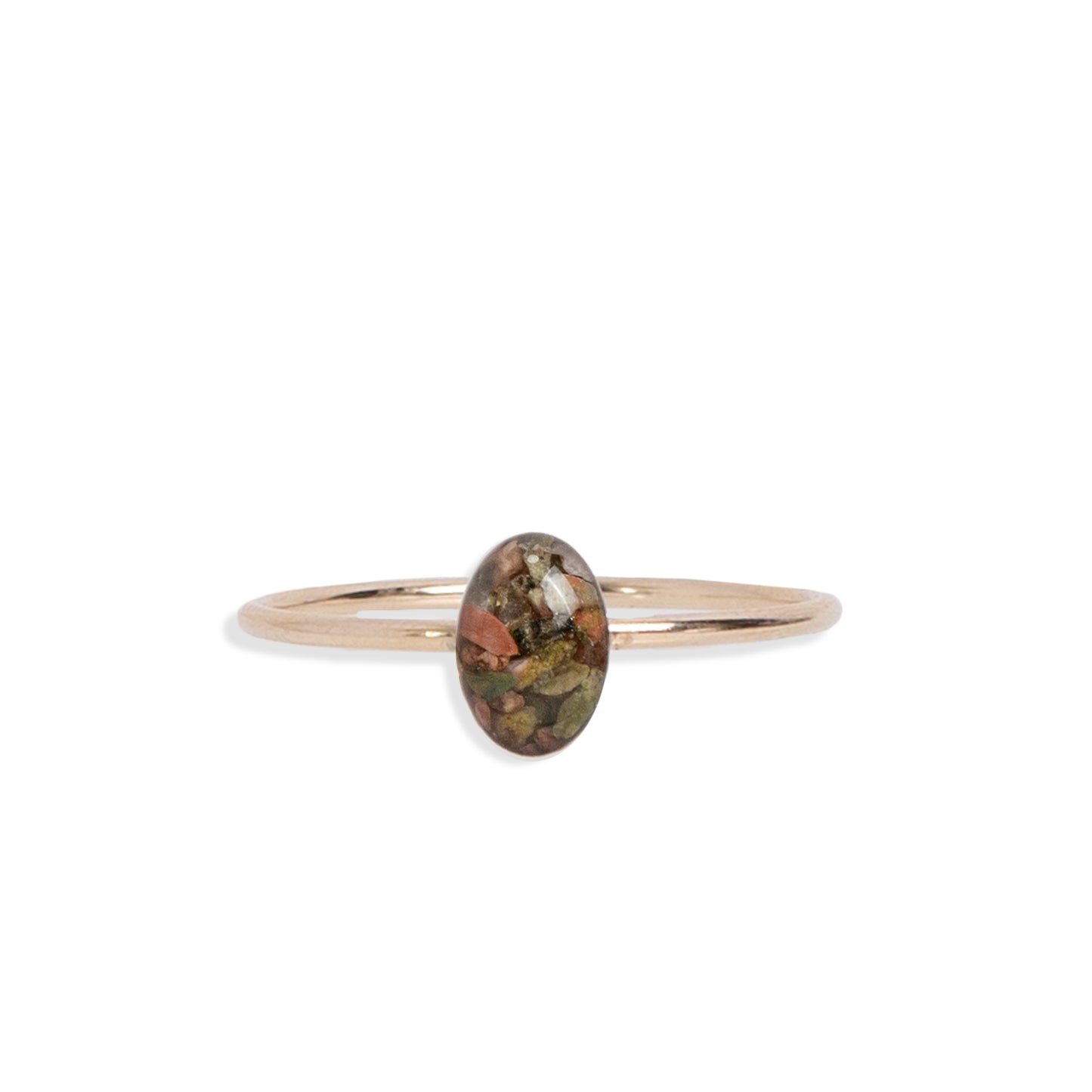 
                  
                    Delicate oval Unakite ring with tiny Unakite stone pieces captured in glass like resin.
                  
                