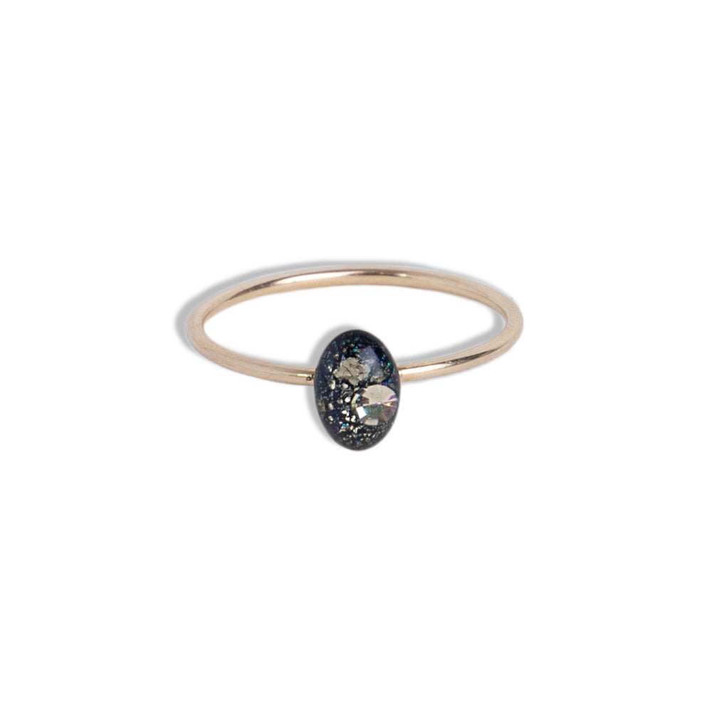 
                      
                        Delicate Tiny Oval Galaxy ring with crushed stones inspired by the pure and authentic energy of the universe
                      
                    