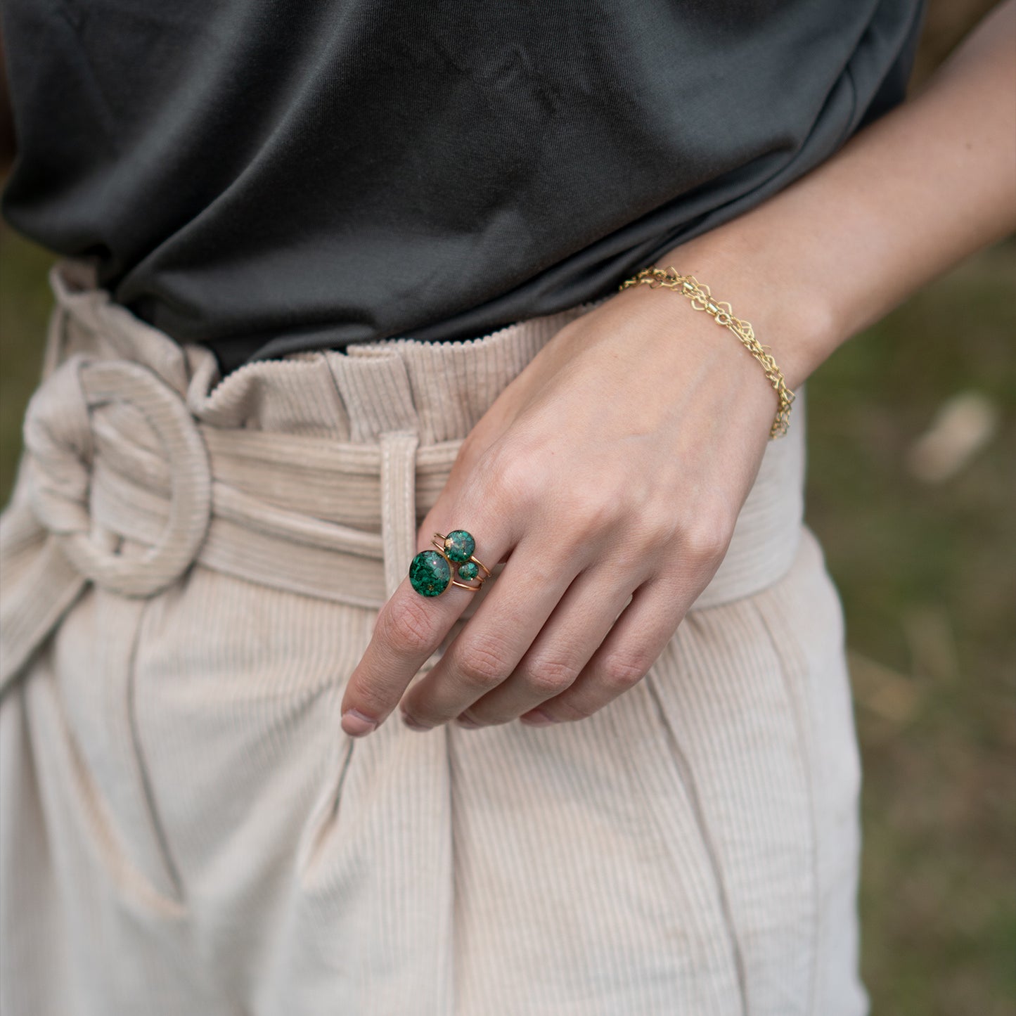 Bright Green ring has crushed Malachite stone pieces captured in glass like resin in a 12mm round shape. Bright natural green ring is a perfect compliment to your everyday style. Beautiful by itself or in a stack. 