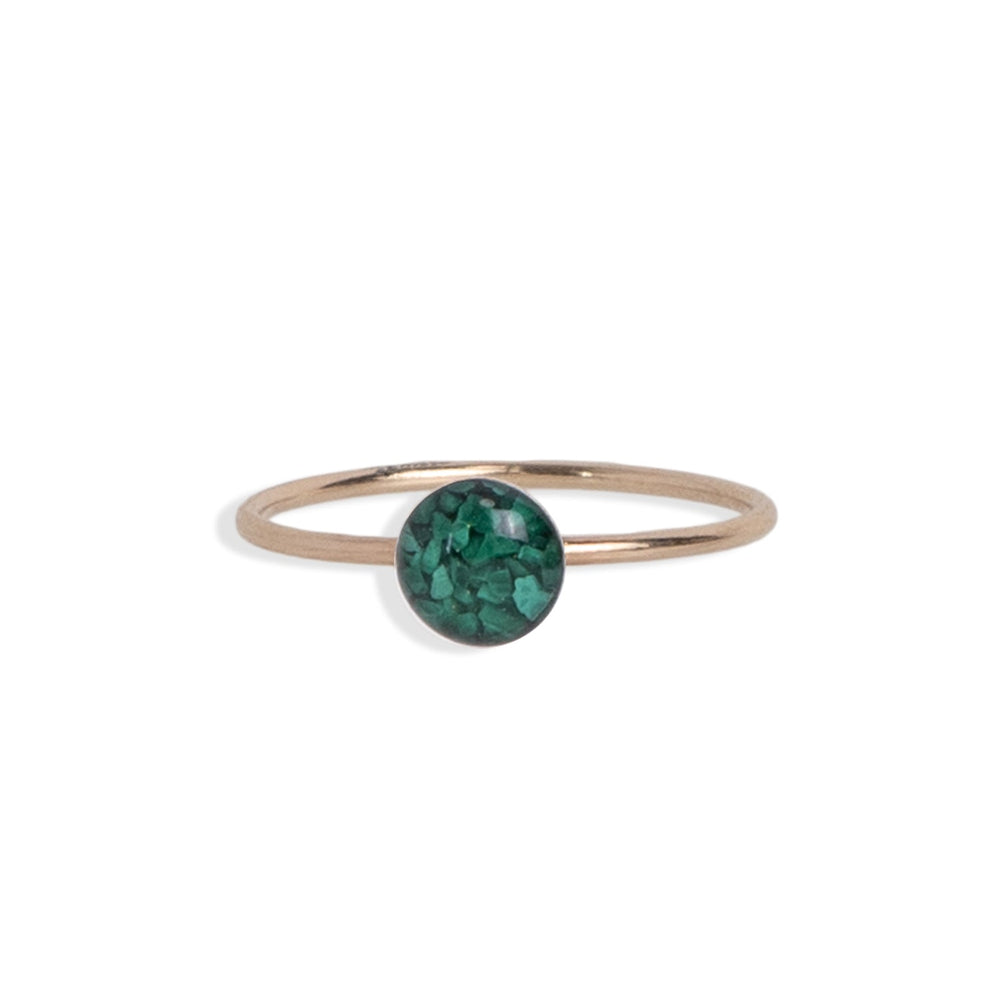 
                  
                    Delicate green ring with tiny Malachite stone pieces is a bright color pop.
                  
                