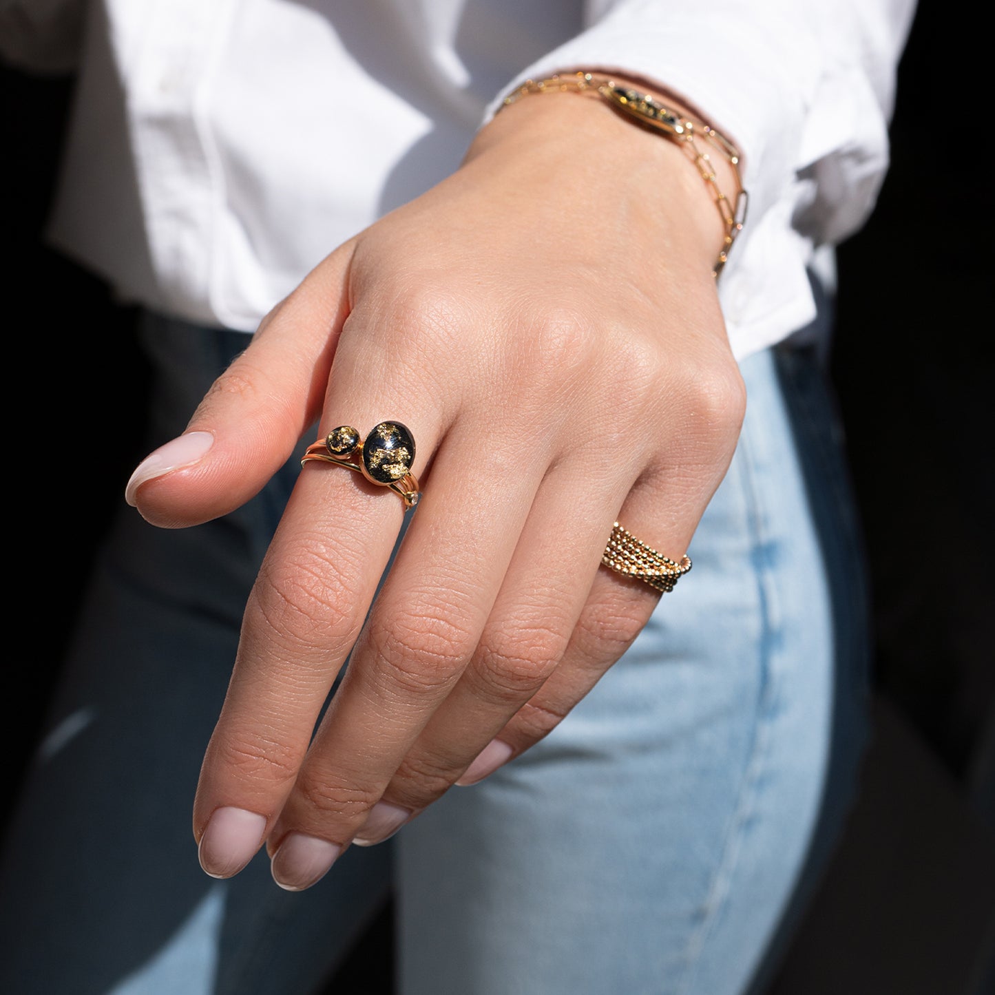
                  
                    Tiny Black and Gold Round Ring
                  
                