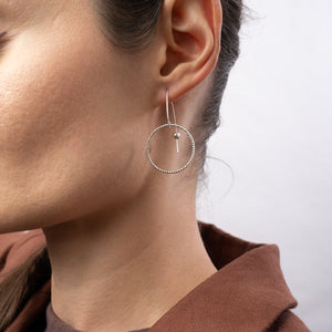 Handcrafted gold-filled disco hoop dangle earrings with textured reflective surface by Kate Koel