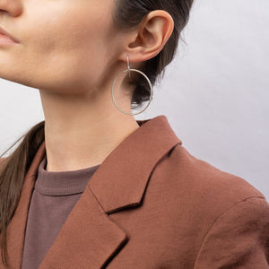 Handcrafted 45mm textured gold-filled disco statement hoop earrings with light-catching sparkle by Kate Koel