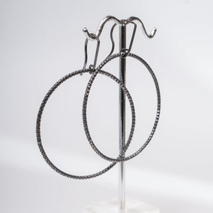 Handcrafted 45mm textured gold-filled disco statement hoop earrings with light-catching sparkle by Kate Koel