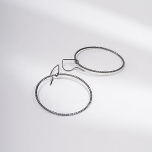 Handcrafted 45mm textured gold-filled disco statement hoop earrings with light-catching sparkle by Kate Koel