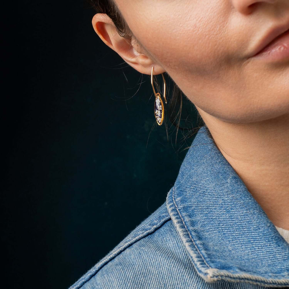 Handcrafted floral oval drop earrings with hand-applied flower design in gold-filled settings by Kate Koel
