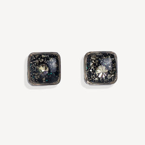 Pair of square stud earrings with gemstones on a white background