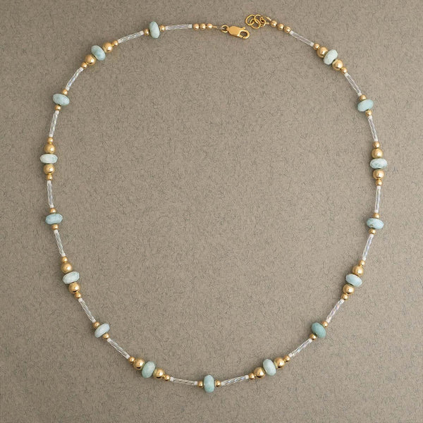 Handcrafted Larimar Gold Beaded Necklace with Caribbean blue stones by Kate Koel