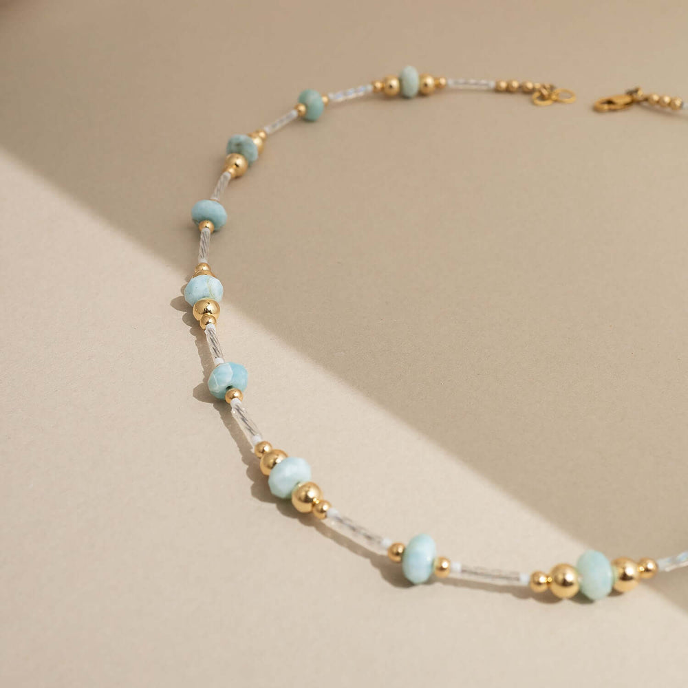 Handcrafted Larimar Gold Beaded Necklace with Caribbean blue stones by Kate Koel