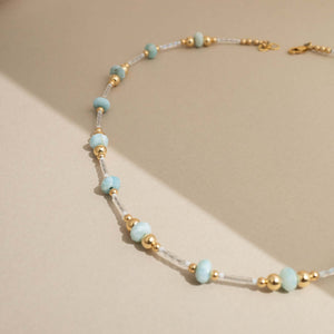 Handcrafted Larimar Gold Beaded Necklace with Caribbean blue stones by Kate Koel