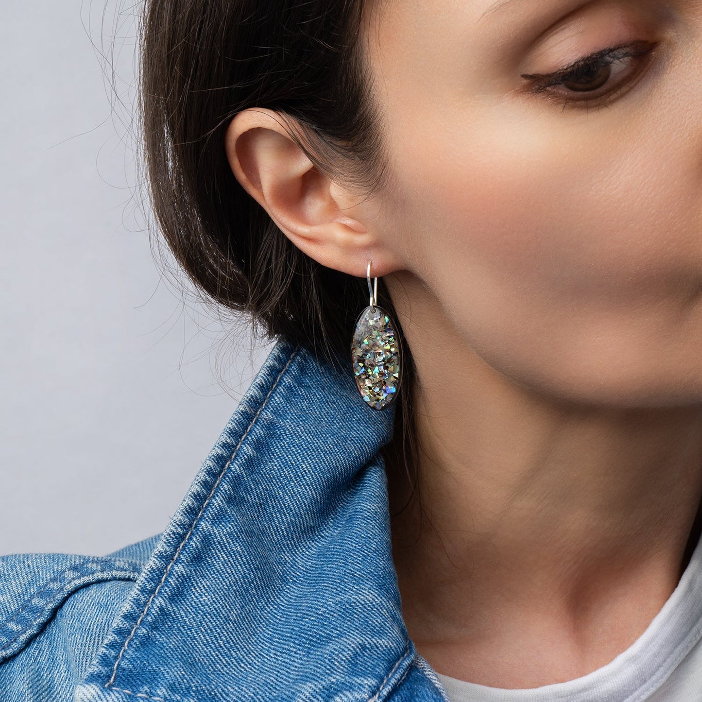 Luminous handcrafted oval earrings with genuine abalone shell in iridescent blue-green tones by Kate Koel