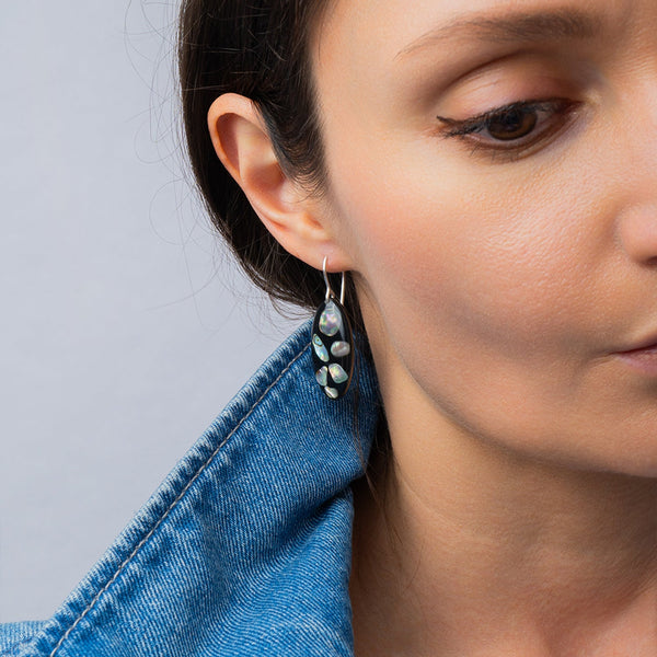 Midnight abalone shell oval drop earrings with genuine iridescent shell on dark background by Kate Koel