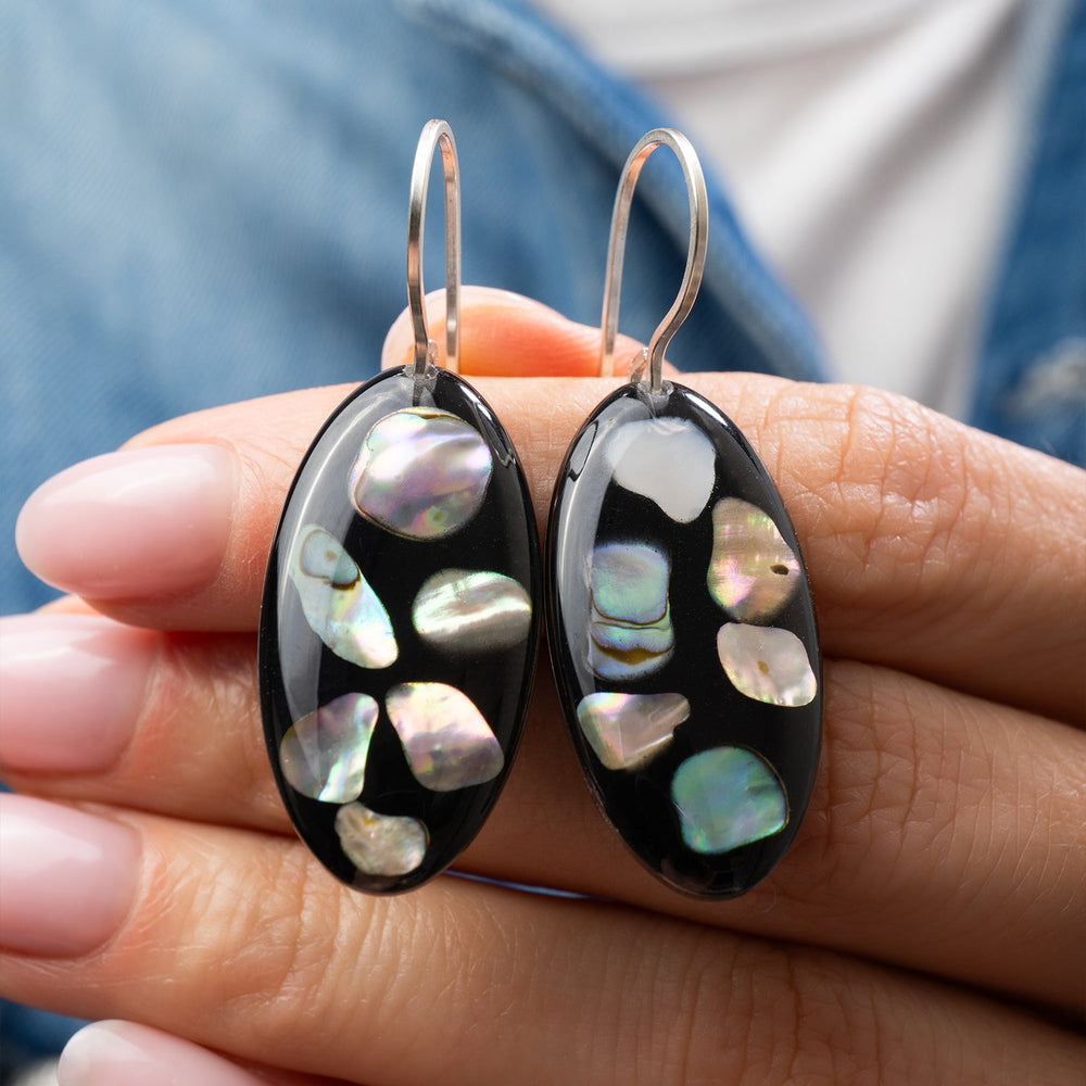 Midnight abalone shell oval drop earrings with genuine iridescent shell on dark background by Kate Koel