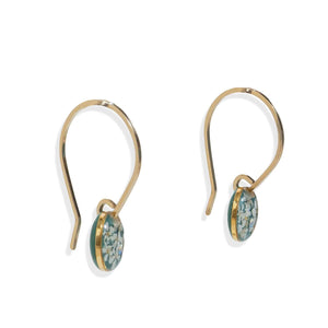Handcrafted minimalist floral hoop earrings with delicate flower accent in gold-filled metal by Kate Koel