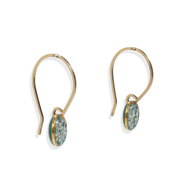 Handcrafted minimalist floral hoop earrings with delicate flower accent in gold-filled metal by Kate Koel