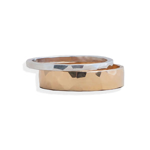 Two gold rings with different finishes on a white background
