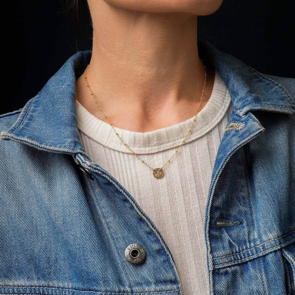 Handcrafted night sky pendant necklace with galaxy-inspired celestial design on gold-filled chain by Kate Koel