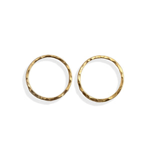 Pair of gold hoop earrings on a white background