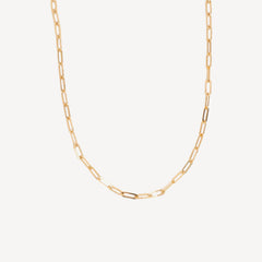 Gold chain necklace on a white background
