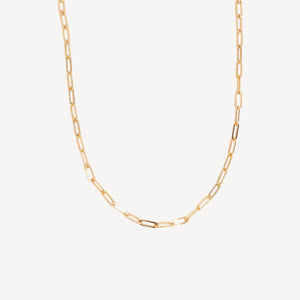Gold chain necklace on a white background