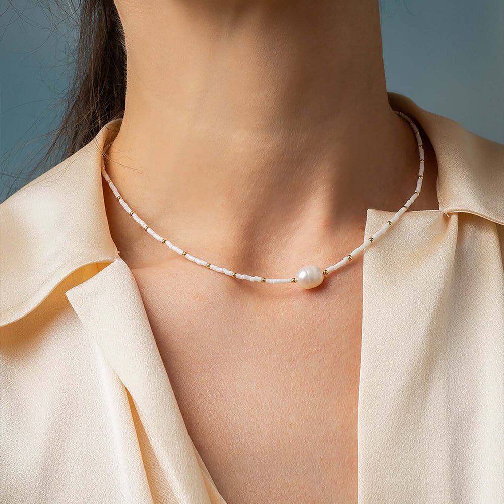 Handcrafted pearl turquoise beaded necklace with freshwater pearls and natural stones by Kate Koel