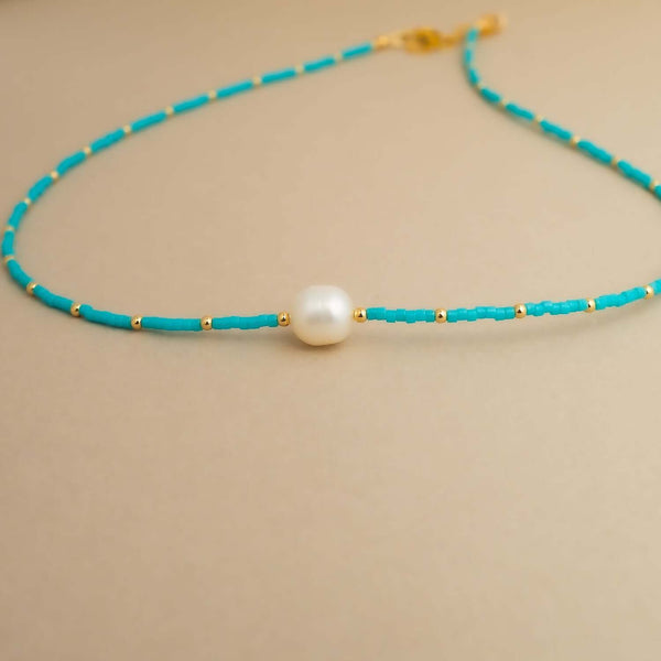 Handcrafted pearl turquoise beaded necklace with freshwater pearls and natural stones by Kate Koel