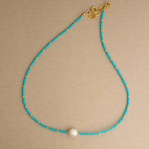 Handcrafted pearl turquoise beaded necklace with freshwater pearls and natural stones by Kate Koel