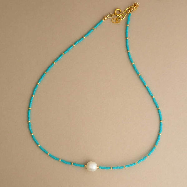 Handcrafted pearl turquoise beaded necklace with freshwater pearls and natural stones by Kate Koel